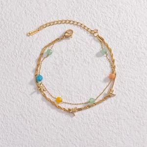 Double-layered 14K gold plated stainless steel bracelet with colored beads and dragonflies