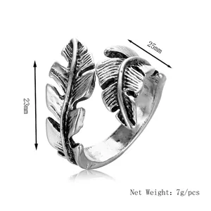 Retro silver feather open ring with detailed carvings and an adjustable vintage design