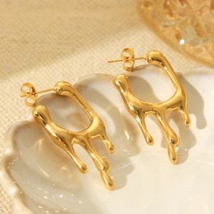 18K gold plated stainless steel lava style earrings on a white shell textured tray