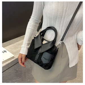 Creative black shirt-shaped tote bag detail with collar, buttons and adjustable strap