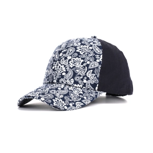Detail view of ethnic paisley print and navy contrast fabric on the baseball cap