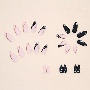 Matte almond press-on nails set with pink and black floral patterns and gold lines