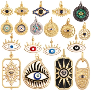 Detailed assortment of evil eye charms in gold and silver finish with colorful enamel