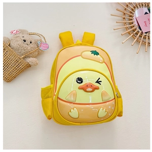 Detail view of a yellow hard shell cartoon chick backpack for preschool children