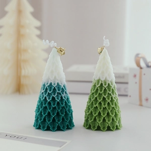 Green gradient Christmas tree scented candles with leaf textures and gold bells
