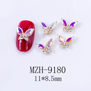 Detailed view of 3D aurora butterfly nail charms in gold metal with size 11x8.5mm