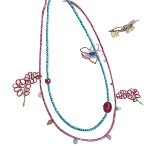 Handmade turquoise and pink gemstone beaded necklace with a Bohemian layered style