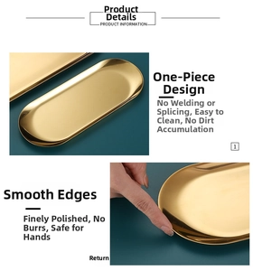 Detail of one-piece molded golden oval stainless steel tray with smooth polished edges