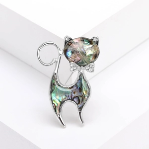 Retro cat brooch with iridescent abalone shell and rhinestones on silver metal