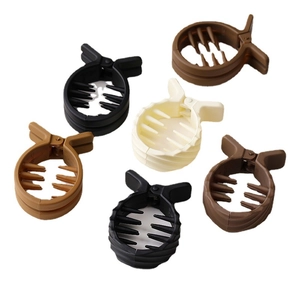 Matte finish high ponytail claw clips set in black brown and cream colors on white base