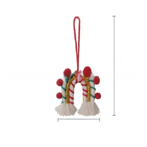 Detail view of handmade woven rainbow Christmas tree ornament with dimensions and tassels