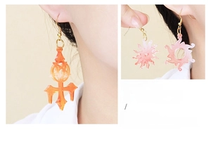 Translucent orange and pink resin jewelry display rack for earring storage and hanging