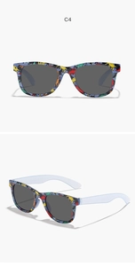 Close-up of kids dinosaur pattern sunglasses showing front and side views with C4 blue temples