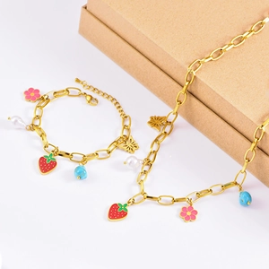 Gold-plated strawberry and butterfly jewelry set with necklace and bracelet charms