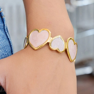 Vintage 18K gold stainless steel bracelet featuring pink marble heart-shaped charms