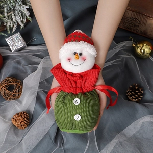 Handmade knitted snowman Christmas gift drawstring bag with red ribbon and white buttons