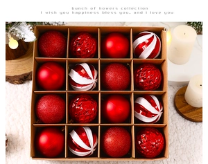 Detailed view of 16-pack red and white Christmas baubles in a kraft gift box display