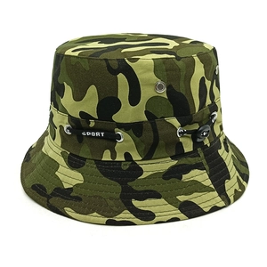 Detail of camouflage bucket hat featuring metal eyelets and adjustable sport drawstring