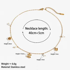 Gold stainless steel necklace with cherry, rose, heart charms and white pearls