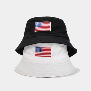 Black and white sun hats featuring embroidered American flags in a stacked view