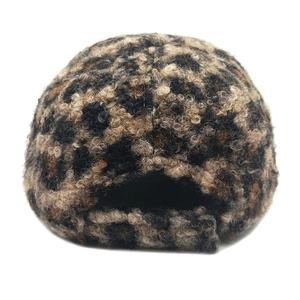 Detail of leopard print faux fur baseball cap showing adjustable velcro strap back closure