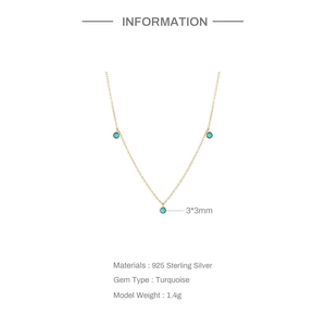 Detail of 925 sterling silver chain with three round turquoise bezel pendants