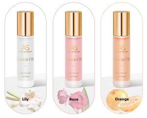 Tres lápices de aceite para cutículas 10ml con aromas a lirio, rosa y naranja