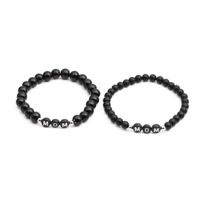 Ensemble de bracelets MOM en perles noires polies et mates avec détails argentés