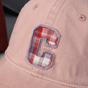 Pink washed cotton baseball cap with plaid C letter embroidery and frayed edges