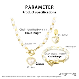 Detail view of gold stainless steel pearl jewelry set with rhinestone heart charms