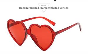 Detail view of transparent red heart-shaped sunglasses with sturdy metal hinges