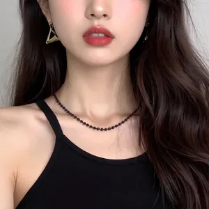 Retro minimalist black bead choker and gold triangle earrings set for women