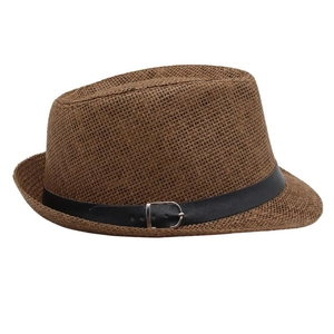 Close-up of woven straw fedora hat featuring a black leather band and silver metal buckle