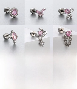 Detailed views of pink zircon titanium steel ear studs in silver with various shapes