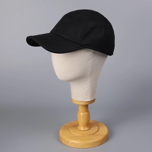 Detail view of the breathable cotton linen fabric and stitching on this black baseball cap