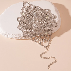 Detailed macro of silver rhinestone flower hand chain with lobster clasp and extension