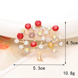 Detail view of a crystal tree brooch with rhinestones showing dimensions 5.3cm by 4.5cm