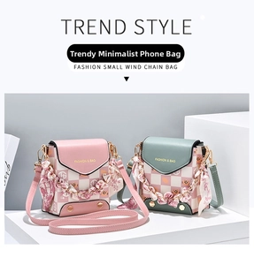 Detail view of mini phone bags in pink and green with checkered patterns and silk scarf chains