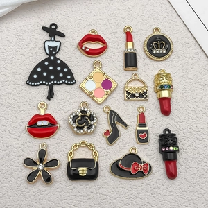 Detailed collection of 15 enamel fashion charms including lipstick and high heels