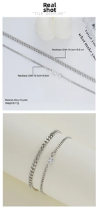 Detail view of silver heart pendant and chunky chain bracelet set with size dimensions