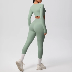 Back view of mint green high-stretch long sleeve yoga top and shaping leggings set