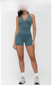 Front view of a woman wearing a Space Blue brushed yoga set with high waist shorts