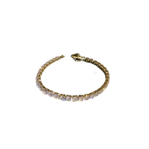 Elegant gold-plated tennis bracelet featuring a row of sparkling round cubic zirconia