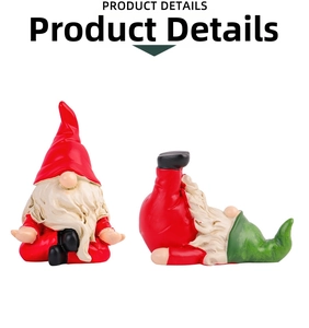 Detailed view of two yoga Christmas gnomes with red and green hats on white background