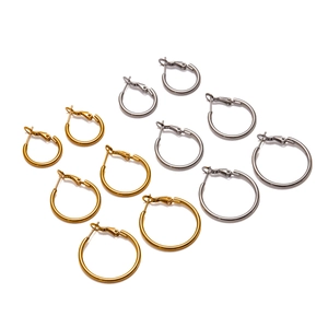 Set of 5 pairs of gold and silver stainless steel hoop earrings in various sizes