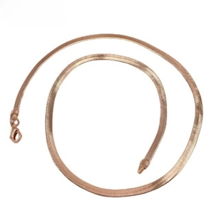 Detailed view of flat rose gold snake bone chain with smooth metallic texture