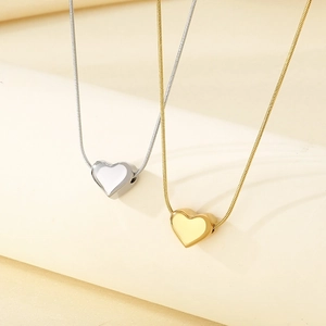 Colliers élégants avec pendentif cœur en or et argent et chaîne serpent pour femme