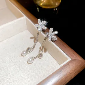 Elegant flower pearl tassel earrings with silver needle and crystal drop detail