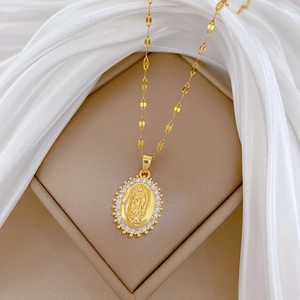 Elegant gold titanium steel necklace with oval pendant and sparkling cubic zirconia stones