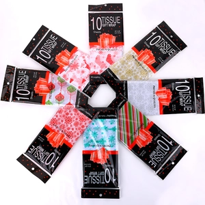 Eight packs of premium Christmas tissue gift wrap with snowflake and tree patterns